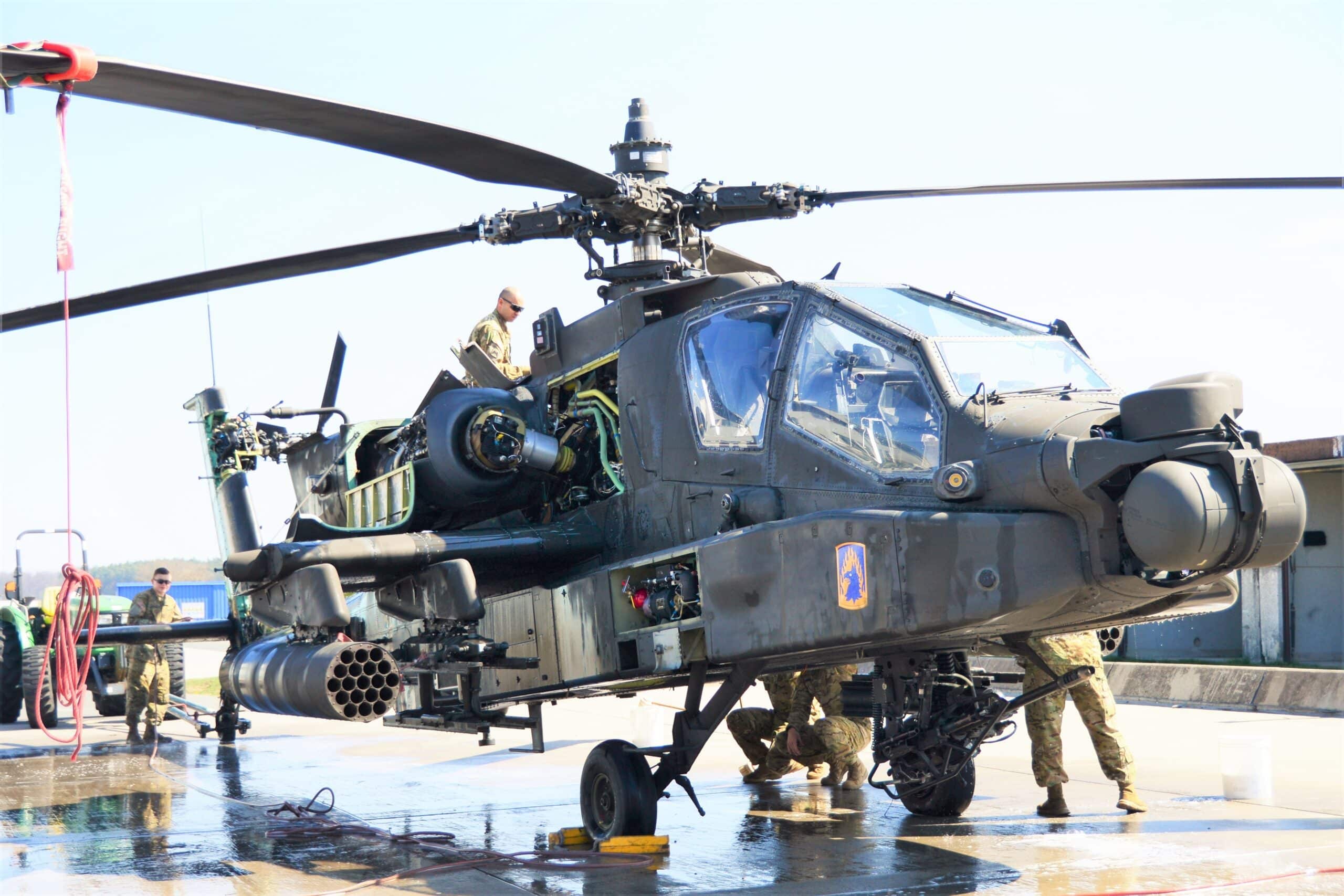 Apache helicopter being cleaned