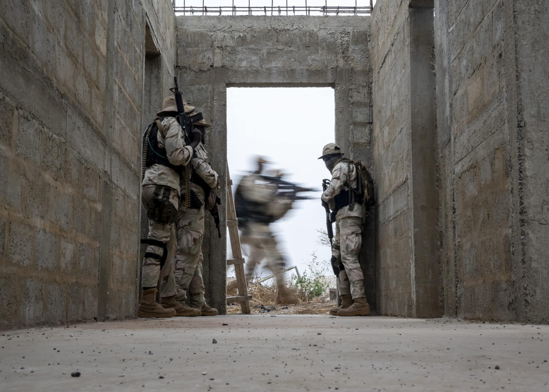 US Special Operation Forces maneuver in a building