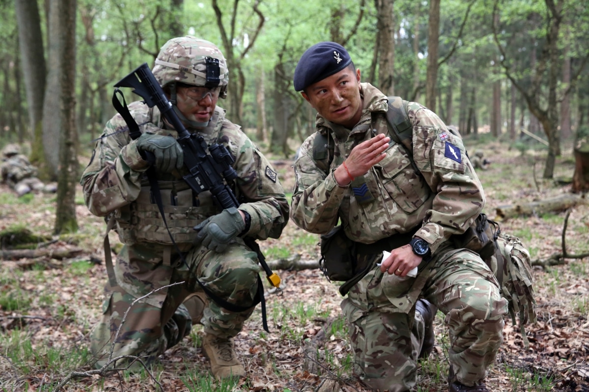 2nd Theater Signal Brigade, during a joint tactical patrol during exercise Stoney Run in the Sennelager Training Area