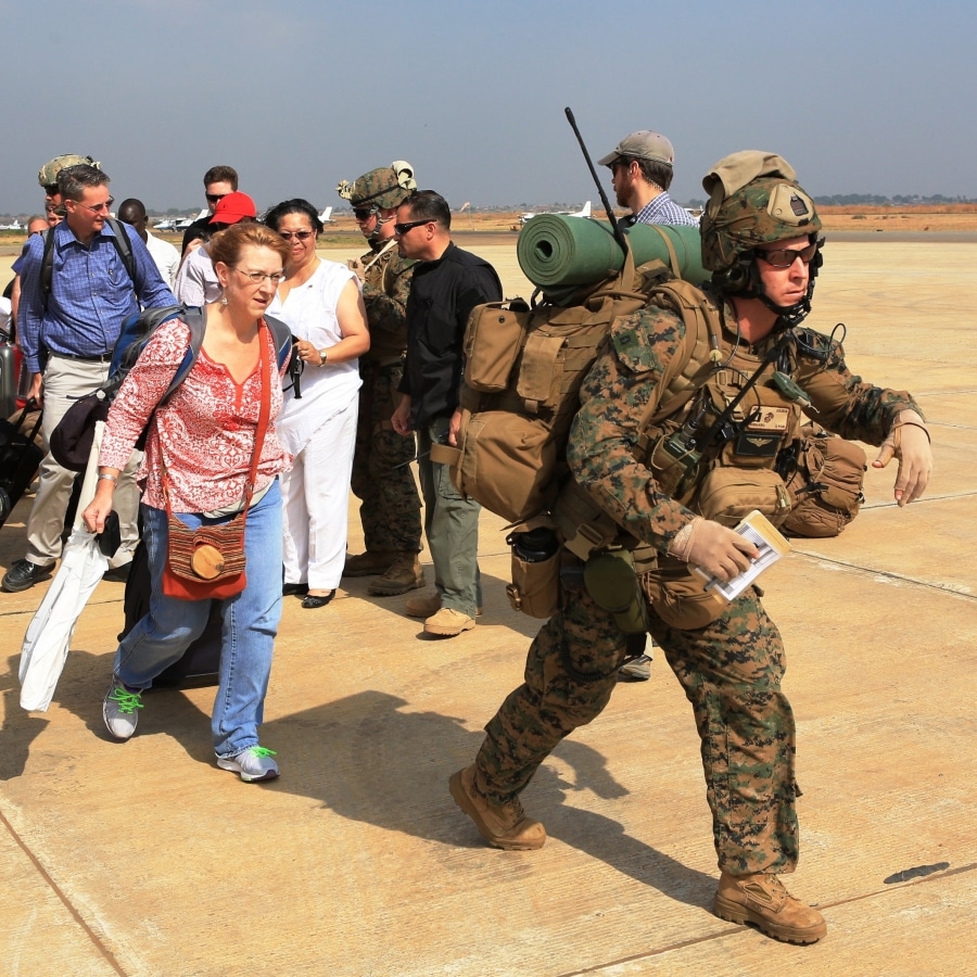 Marines Special-Purpose Marine Air-Ground Task Force Crisis Response guide U.S. citizens down the flight line in Juba, South Sudan