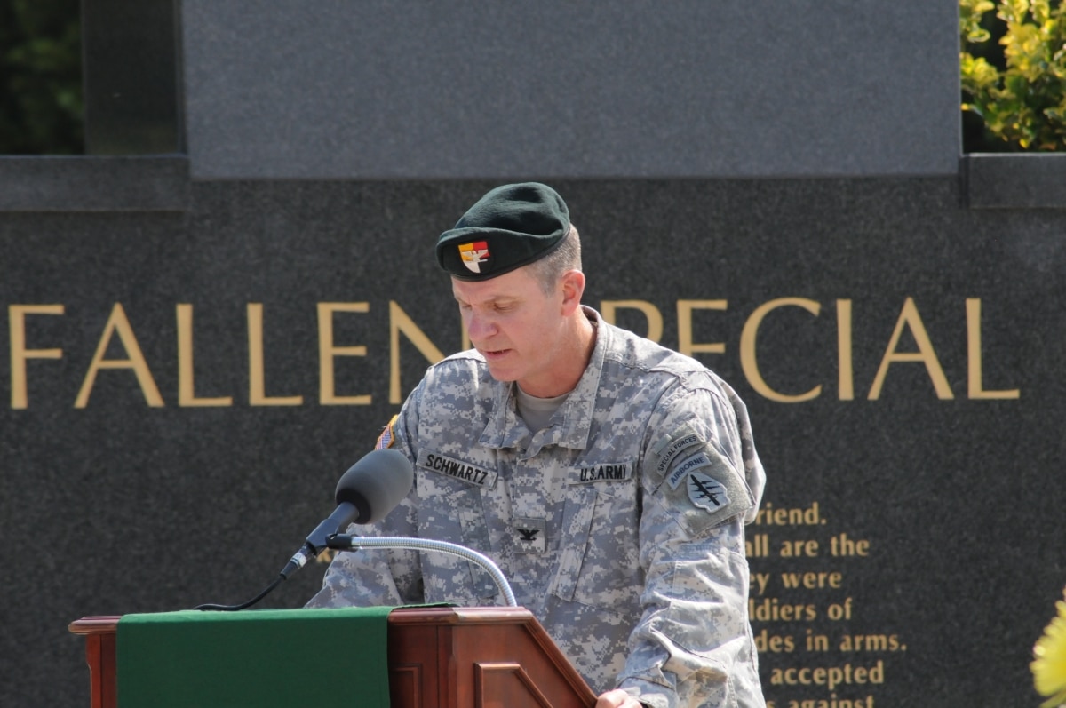 Col. Mark Schwartz, 3rd Special Forces Group (Airborne) commander speaks to the audience during a dedication ceremony for the newly unveiled 3rd Special Forces Group