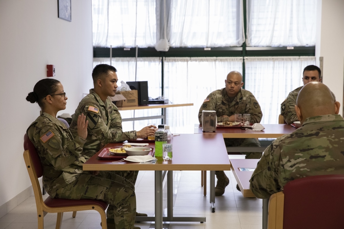 Command Sgt. Maj. Julie Saorrono of Army Contracting Command leads a professional development discussion over lunch