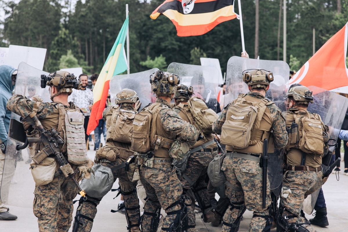 U.S. Marines with the 26th Marine Expeditionary Unit utilize crowd control techniques during a Non-combatant Evacuation Operation (NEO) as part of Amphibious Ready Group