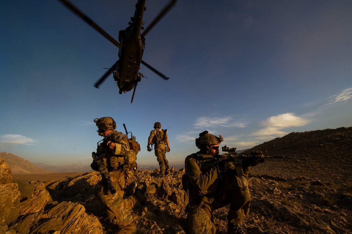 U.S. Air Force pararescuemen, 83rd Expeditionary Rescue Squadron, secure the area after being lowered from a U.S. Air Force HH-60 Pave Hawk during a mission Nov. 7, 2012, in Afghanistan. Pararescue teams assault