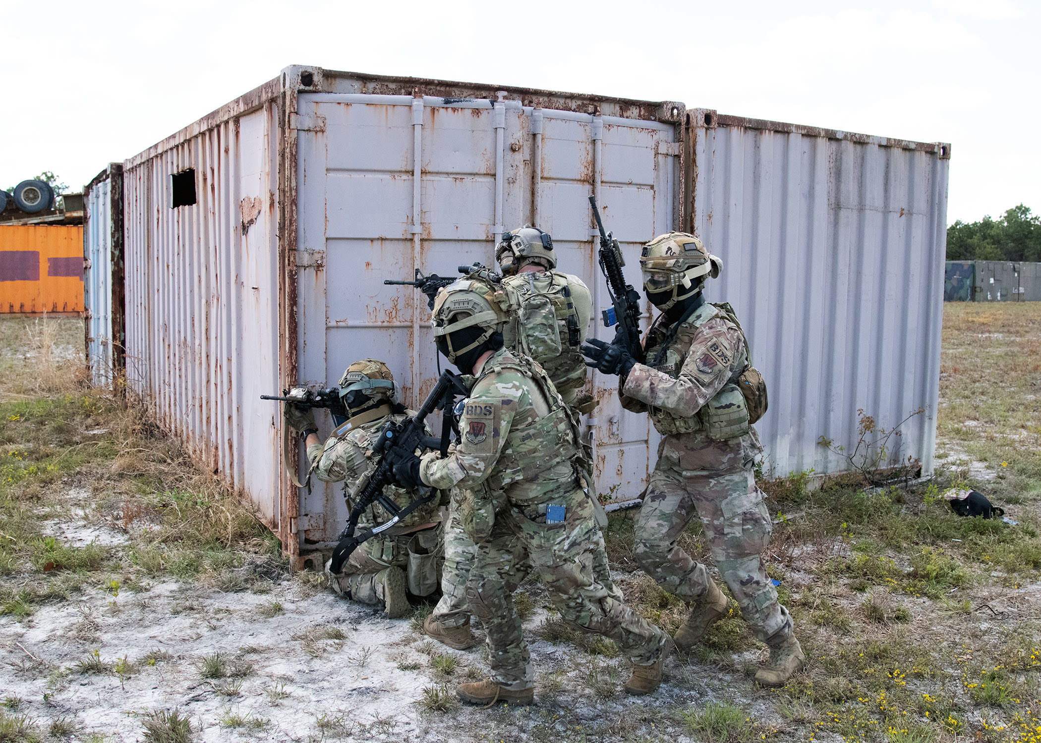 Airmen from the 105th Base Defense Squadron conduct a ground assault during a training exercise at Warren Grove Bombing Range, Ocean County