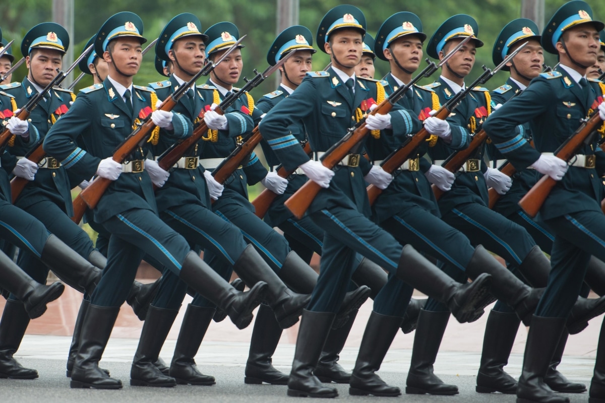 Chairman of the Joint Chiefs of Staff Gen. Martin E. Dempsey participates in a Vietnamese honor guard ceremony at the Ministry of Defense for the Socialist Republic of Vietnam in Hanoi, Vietnam