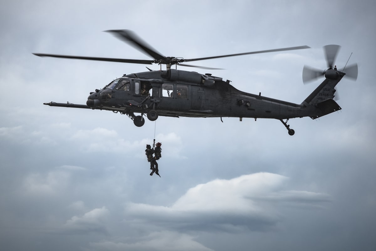 Pararescuemen assigned to the 38th Rescue Squadron (RQS), are hoisted into an HH-60G Pave Hawk