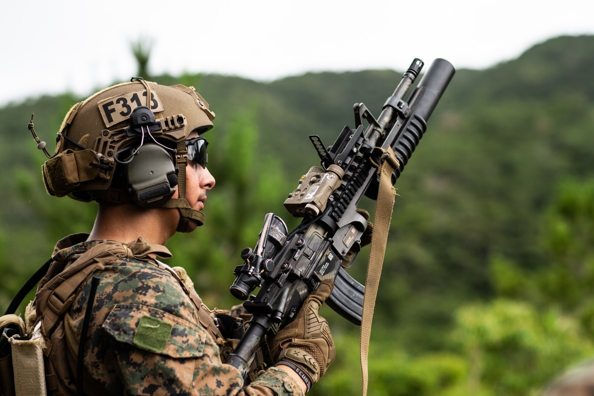 A U.S. Marine with Force Reconnaissance Platoon, 31st Marine Expeditionary Unit (MEU), conducts a live fire drill with a M203 grenade launcher on Camp Hansen, Okinawa, Japan, June 4, 2021. Marines with the 31st MEU regularly conduct live fire drills to maintain proficiency with multiple weapon systems.