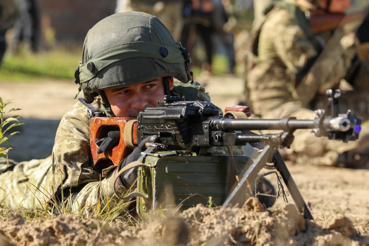 A Ukrainian soldier pulls security during an anti-sabotage exercise as part of Rapid Trident 2021 at Combat Training Center-Yavoriv near Yavoriv, Ukraine