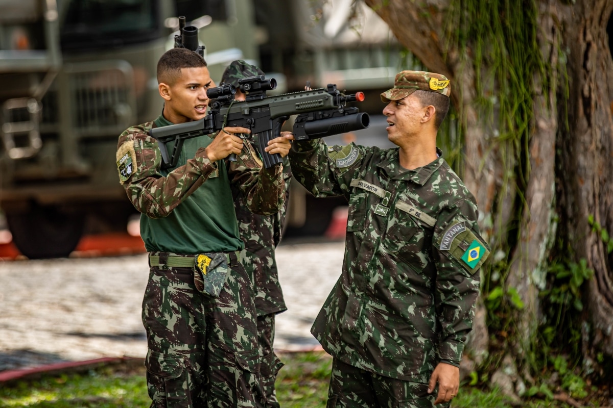 A Brazilian army soldier assigned to 5th Light Infantry Battalion, 12th Infantry Brigade aims a grenade launcher attached to an IMBEL IA2 carbine while receiving instruction at 5th Light Infantry Battalion in Lorena, Brazil