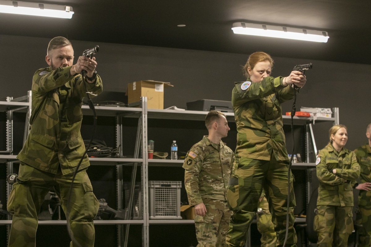 Norway's Heimevernet Rapid Reaction Force participating in the 49th annual U.S.-Norwegian Reciprocal Troop Exchange conducted the Engagement Skills Trainer at Camp Ripley