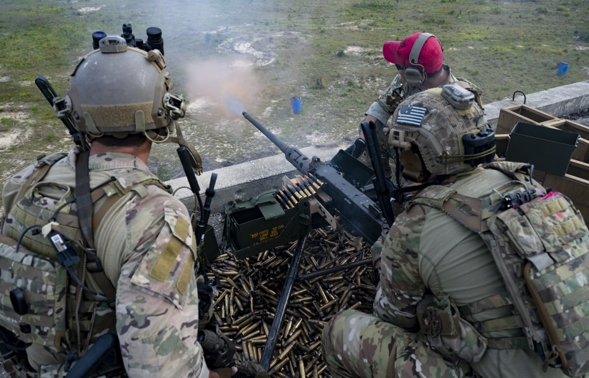 U.S. Air Force Special Tactics operators assigned to the 24th Special Operations Wing provides support fire with an M2 .50 caliber machine gun during Emerald Warrior