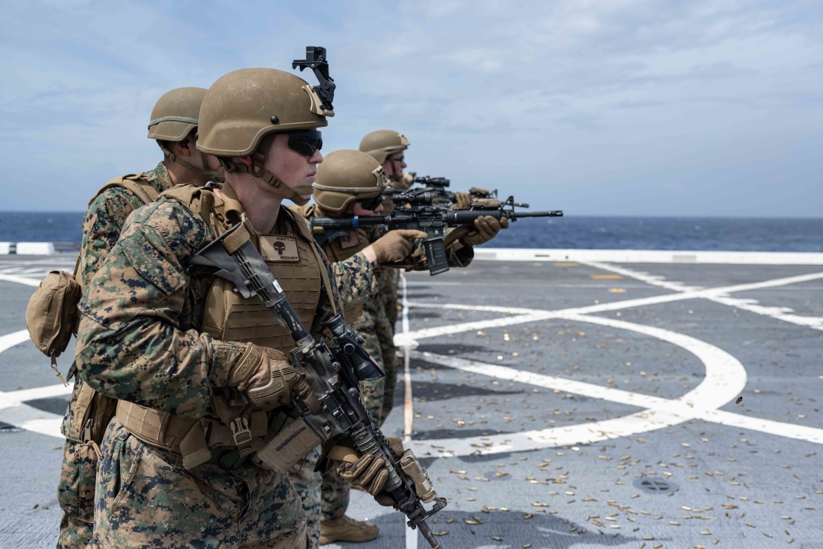 220912-N-XB010-2007 SEA OF JAPAN (Sept. 12, 2022) – Marines assigned to the 31st Marine Expeditionary Unit (MEU) participate in a live-fire shoot with M-4 rifles on the forward-deployed amphibious transport dock ship USS New Orleans