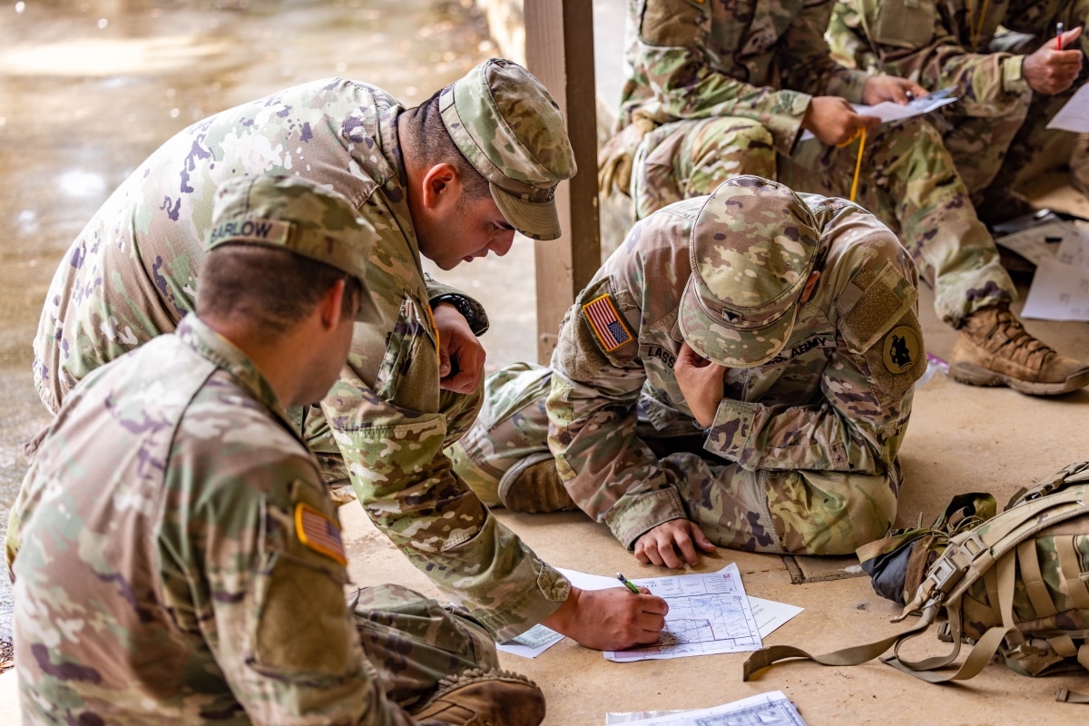 U.S. Army South Soldiers conduct land navigation training during a staff exercise at Joint Base San Antonio-Camp Bullis, May 9, 2023. During the staff exercise Army South's Headquarters and Headquarters Support Battalion Soldiers simulated deploying