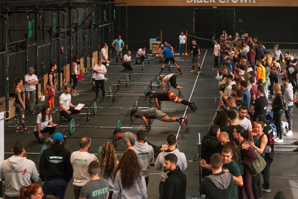 Madrid, Spain - April 14, 2019: Athletes realizing burpees in the 4th interbox crossfit league competition.