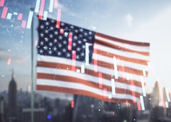 Double exposure of abstract virtual global crisis chart and world map hologram on USA flag and blurry cityscape background. Financial crisis and recession concept