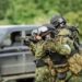 Russian special forces operators in uniform and bulletproof vest and helmets Russian special forces operators in uniform and bulletproof vest and helmets