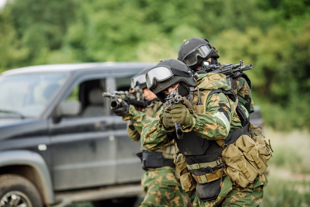 Russian special forces operators in uniform and bulletproof vest and helmets Russian special forces operators in uniform and bulletproof vest and helmets