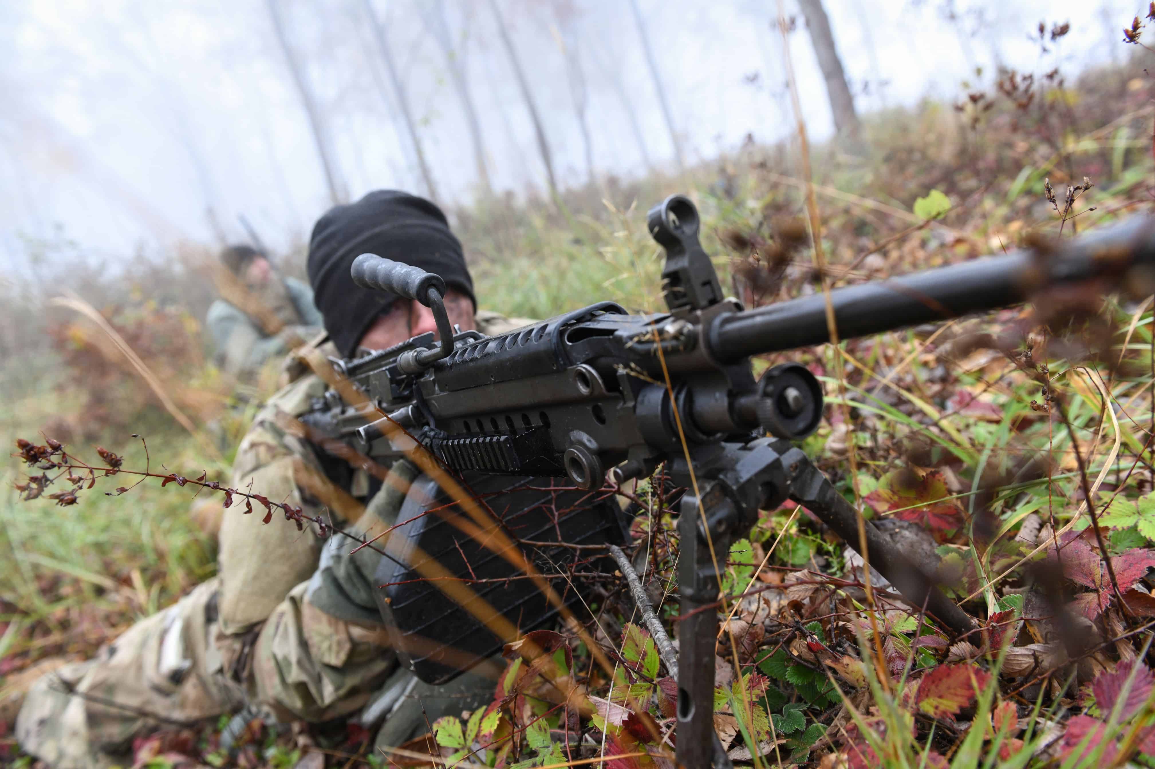 U.S. Army Pfc. Bobby Taylor, a Greenfield, Ind. soldier assigned to the 1st Squadron, 152nd Cavalry Regiment, 76th Infantry Brigade Combat Team, 38th Infantry Division, Indiana Army National Guard, mans an M249 light machine gun during a reconnaissance and surveillance rehearsal exercise