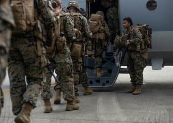 U.S. Marines with 3d Marine Division board a KC-130J Super Hercules during an Alert Contingency Marine Air-Ground Task Force (ACM) drill on Okinawa, Japan, initiating the deployment of the Division’s Forward Command
