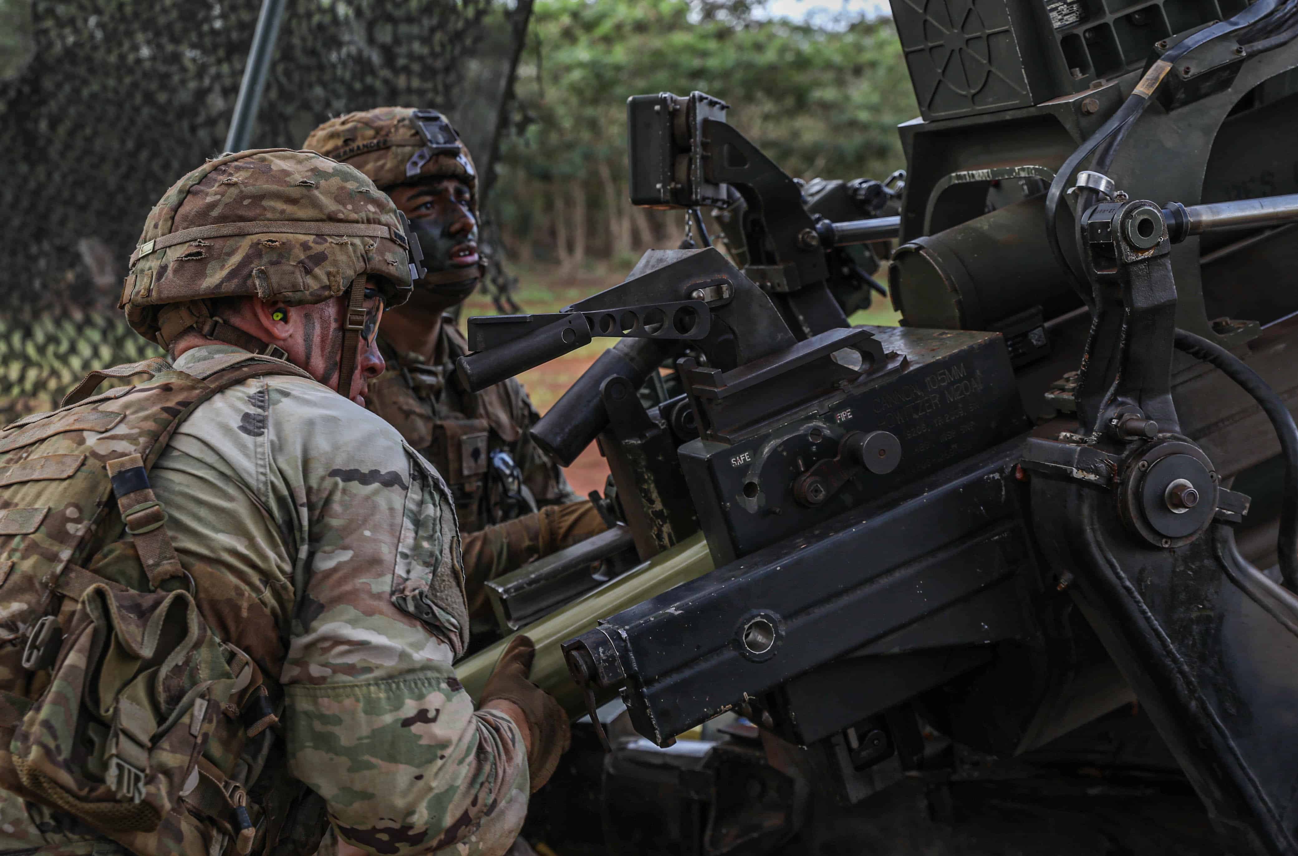 U.S. Army Soldiers with 2nd Battalion, 11th Field Artillery Regiment, 25th Infantry Division Artillery perform direct fire with a M119 howitzer as part of DIVARTY’s Best By Test Competition