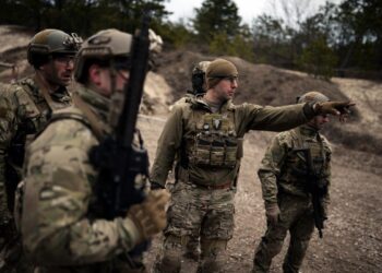 Tech. Sgt. Jason Cangemi briefs members of the 103rd Rescue Squadron, 106th Rescue Wing on the upcoming course during a multi-day training event at the firing range on April