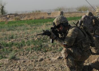 Sgt. 1st Class Douglas Queen, the platoon sergeant for 2nd Platoon, Alpha Company, 1st Battalion, 508th Parachute Infantry Regiment, 4th Brigade Combat Team, 82nd Airborne Division, pulls security while on patrol in Maiwand district, April 4. Alpha company provided the blocking element for Operation Sham Shir.