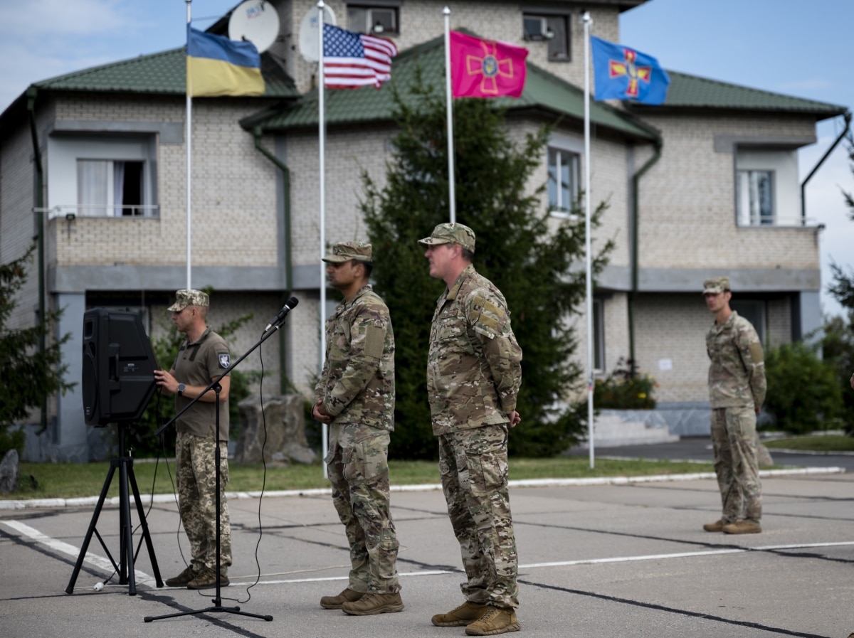U.S. Air Force members assigned to the 352d Special Operations Wing, Ukrainian Air Force and Ukrainian Special Operations Command members conduct an opening ceremony beginning a month of interoperability training events in Vinnytsia, Ukraine