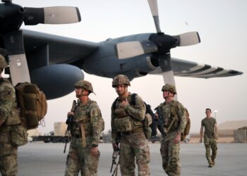 A platoon of Soldiers from the 256th Infantry Brigade Combat Team, Louisiana National Guard, board a U.S. Air Force flight leaving Al Asad Air Base in western Iraq