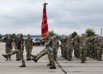 U.S. Air Force members assigned to the 352d Special Operations Wing and Ukrainian Air Force members assigned to the 456th Air Transportation Brigade participate in a ceremony for the brigade's anniversary of creation in Vinnytsia