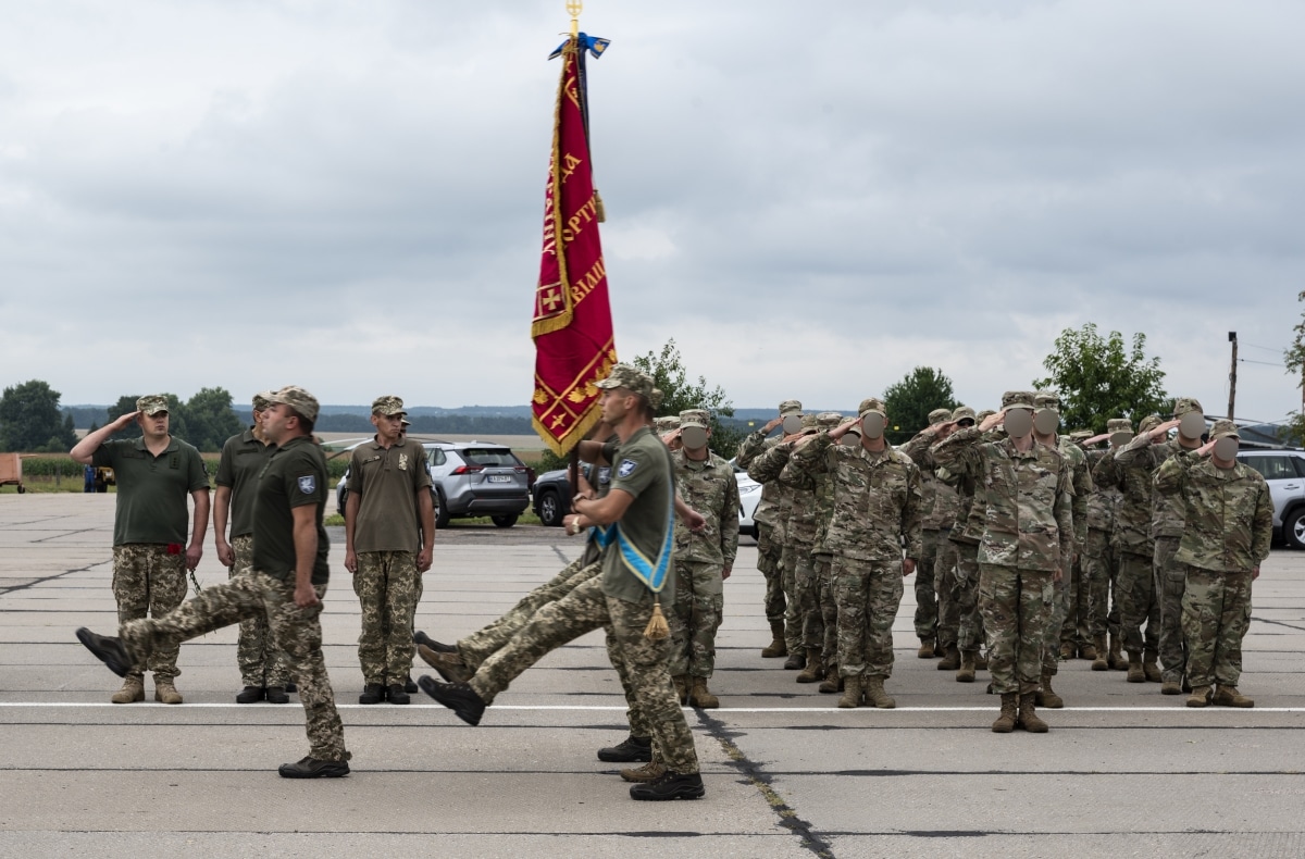 U.S. Air Force members assigned to the 352d Special Operations Wing and Ukrainian Air Force members assigned to the 456th Air Transportation Brigade participate in a ceremony for the brigade's anniversary of creation in Vinnytsia