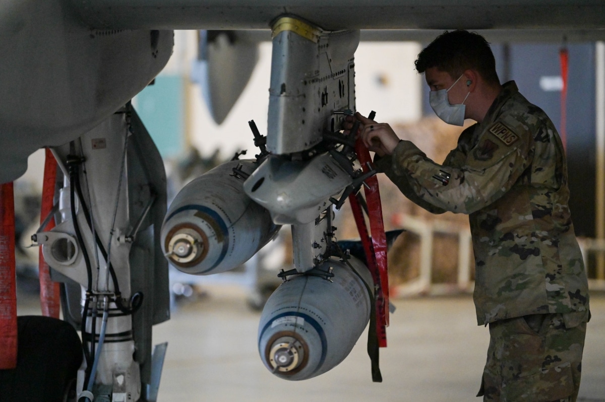 U.S. Air Force Senior Airman Alec Whitacre, 23rd Aircraft Maintenance Group weapons load crew member, evaluates an A-10C Thunderbolt II weapons at Moody Air Force Base