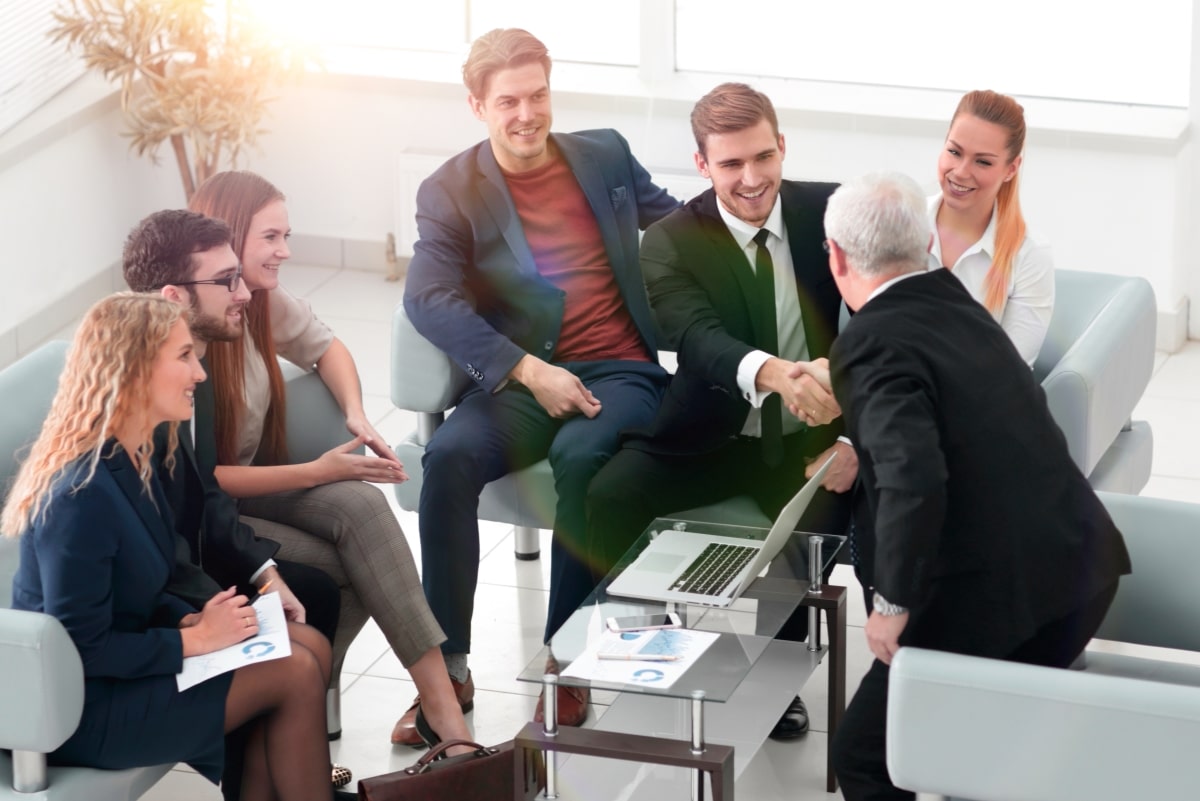 handshake of business people at a corporate meeting in the office