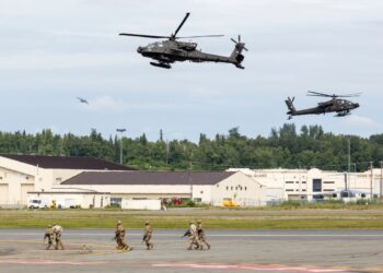 ANCHORAGE, ALASKA / USA - June 30, 2018: A United States Arms AH-64 Apache performs a show of force demo
