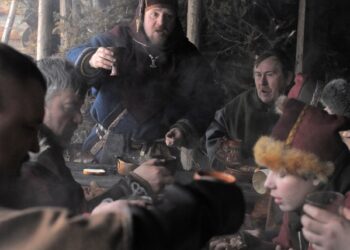 Russia, Saint-Petersburg. 26,01,2014 The festival is a historical reconstruction of the Viking Age in winter. Medieval dining - the Vikings at the table