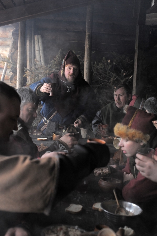 Russia, Saint-Petersburg. 26,01,2014 The festival is a historical reconstruction of the Viking Age in winter. Medieval dining - the Vikings at the table