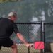 A senior competes in the singles division of a pickleball tournament