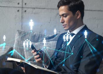 Man office takes notes use phone media concept. Double exposure.