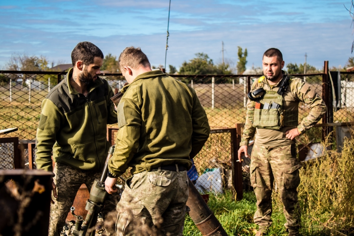 Ukraine, Kherson - October 21, 2022 Ukrainian army infantry soldiers on the front line, they specialize in mortar fire from enemy lines.