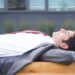Businessman with black hair relaxing outside