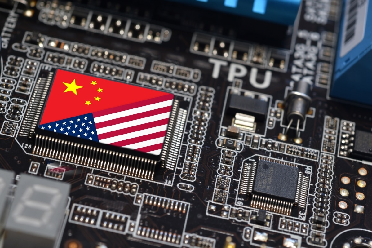 Flag of the Republic of China and the United States on microchip of a printed electronic board. Concept for world supremacy in microchip and semiconductor manufacturing.