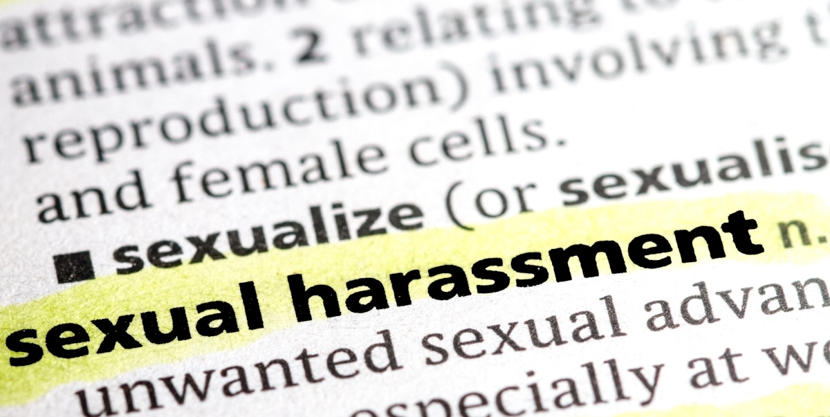 close up photo of the words sexual harassment