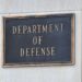 A Department of Defense plaque is seen outside the Pentagon in Washington