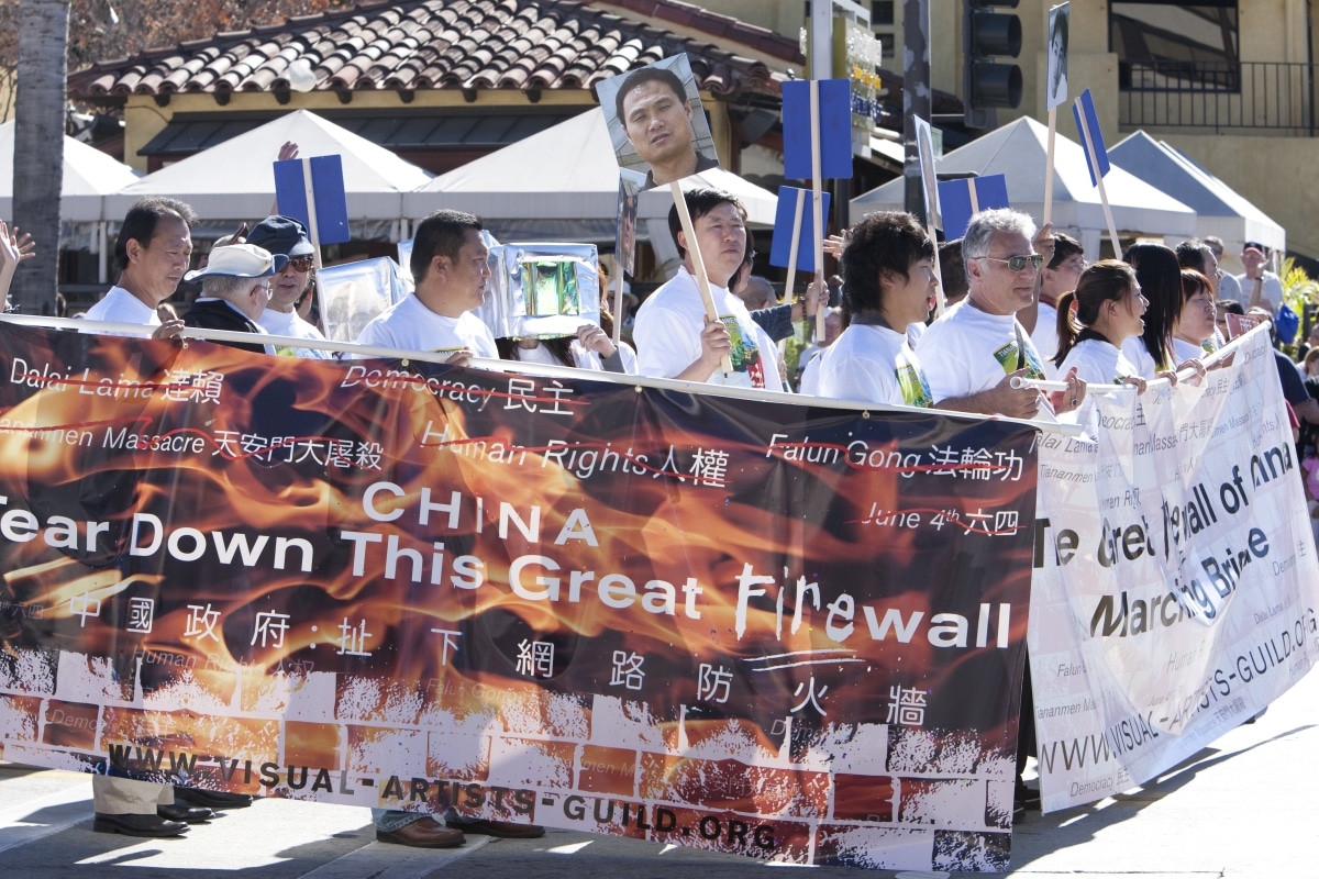 PASADENA, CA - JANUARY 18: Protesters march against China's censorship of the internet at the Doo Dah Parade on January 18, 2009 in Pasadena.