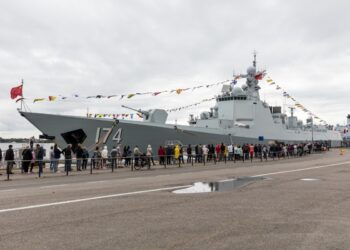 HELSINKI, FINLAND - AUGUST 2, 2017: Chinese warships visiting Helsinki, Finland August 1.-4. The picture shows the type 052D destroyer Hefei. People are waiting for access to the ship.