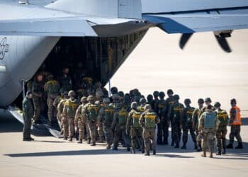 Paratroopers entering a US Air Force C-130 Hercules transport plane on Eindhoven airbase. The Netherlands - September 20, 2019