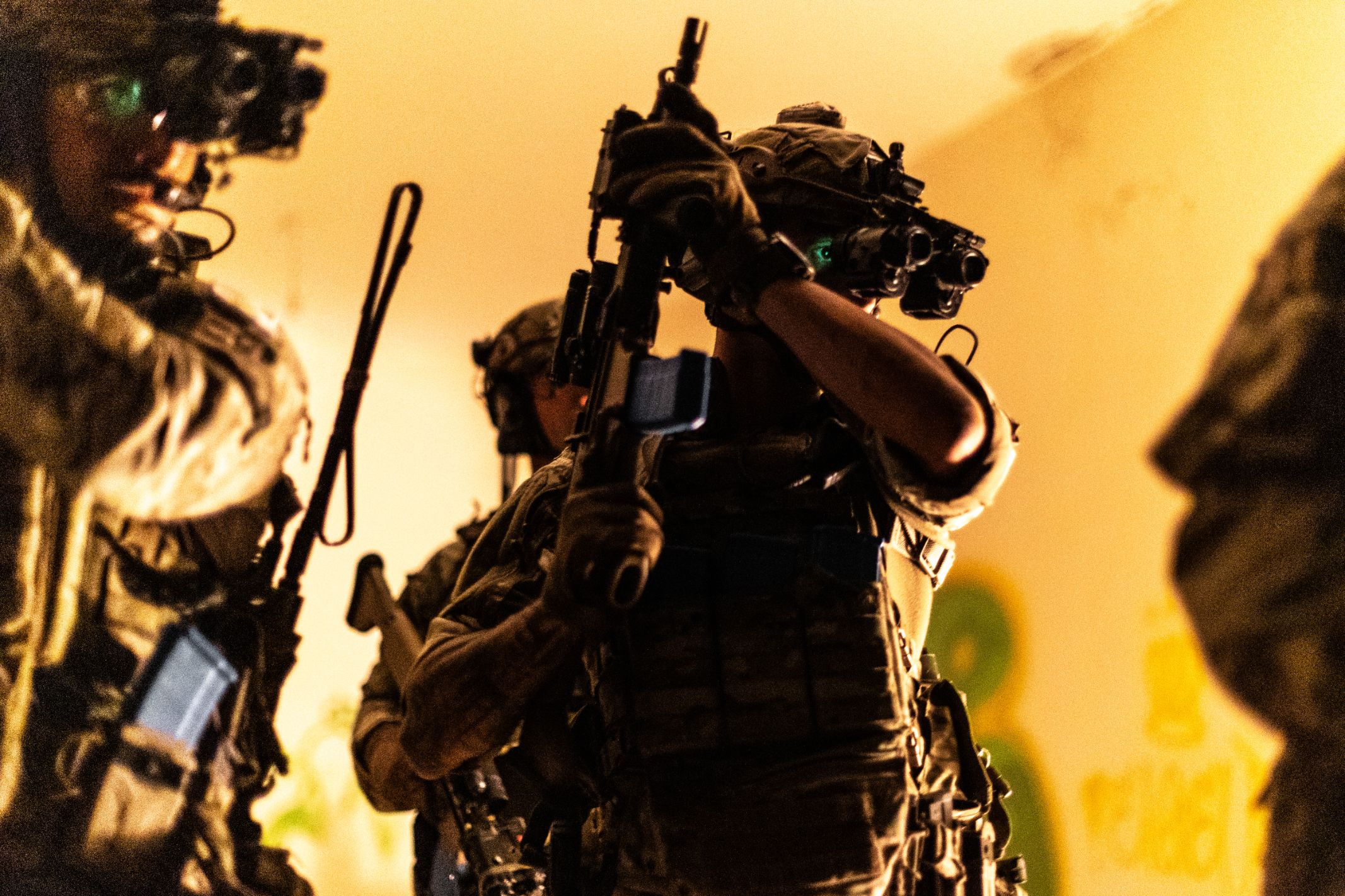 Cypriot Army Special Forces soldiers move through a house during a simulated raid with members of U.S. Naval Special Warfare Task Unit Europe (NSWTU-E) in Cyprus