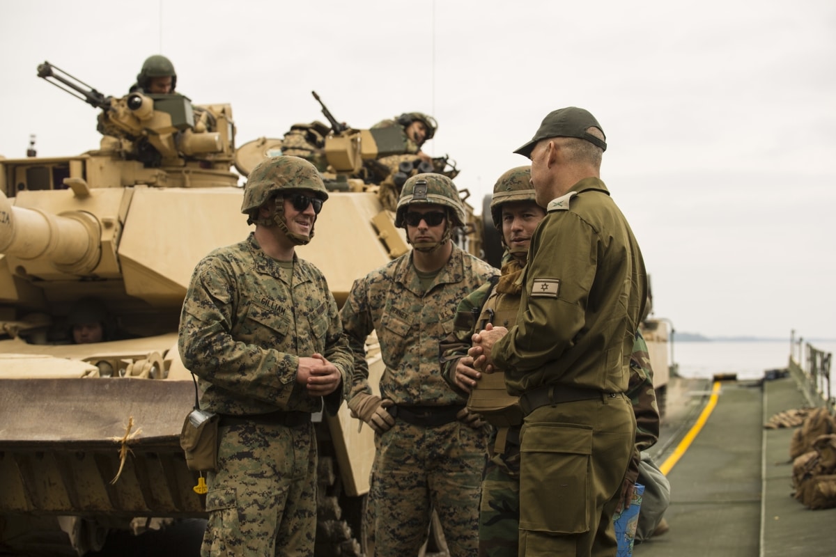 Brig. Gen. Uri Gordin, the commanding general of the 98th Division, Israel Defense Forces, speaks to Marines with 2nd Tank Battalion, 2nd Marine Division about the M1A1 Abrams Main Battle Tank during exercise Iron Blitz at Camp Lejeune