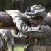 U.S. Marine Corps Lance Cpl. Kennethcooper Virgil, a rifleman with Special Purpose Marine Air-Ground Task Force-Crisis Response-Africa, carries a log with his squad across steep terrain for the final exercise of a stress event held by U.S. Army Special Forces in Germany