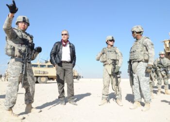 U.S. Army Staff Sgt. Oscar Martinez, of Headquarters Company, 1st Battalion, 68th Armor Regiment, 3rd Advise and Assist Brigade, 4th Infantry Division, briefs U.S. personnel on the walking route to the Iraq-Iran point of entry outside of Contingency Operating Base Minden, Iraq